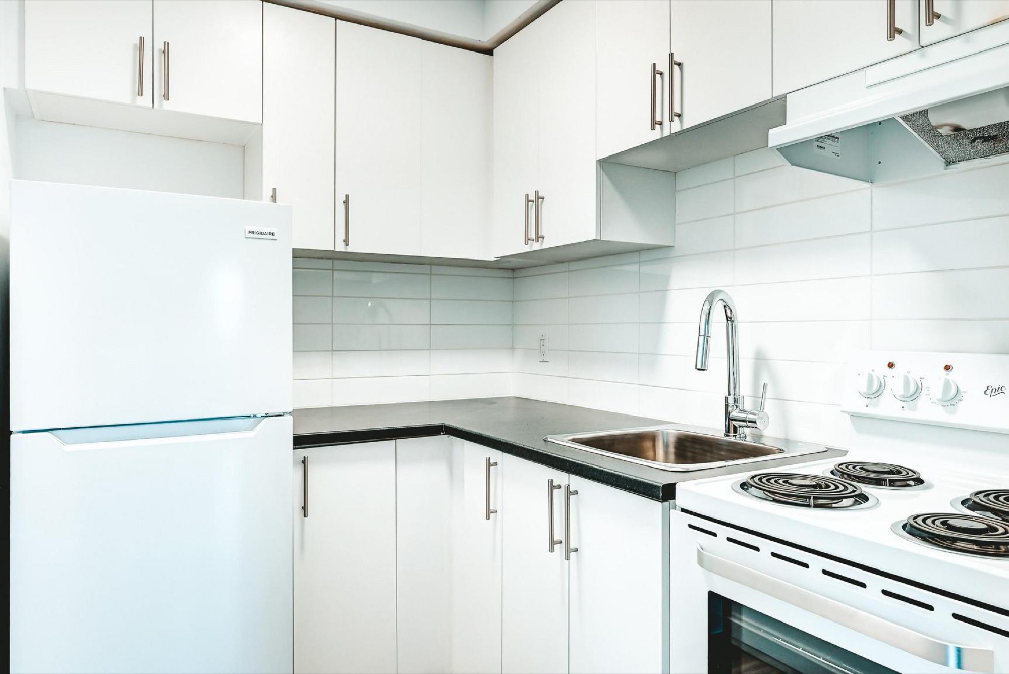 Renovated white kitchen at Domaine Choisy